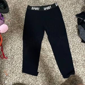 black shein pants that say sport on the band